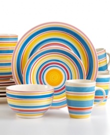 Primary colors band and swirl together around Sarita Rainbow dinnerware, filling everyday meals with cheer. Bowls, mugs and plates in hard-wearing stoneware add to its appeal, transitioning easily from the microwave or dishwasher, back on the table. Primary colors band and swirl together around Sarita Rainbow dinnerware, filling everyday meals with cheer. Bowls, mugs and plates in hard-wearing stoneware add to its appeal, transitioning easily from the microwave or dishwasher, back on the table.