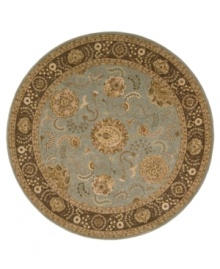 A muted blue field is accented with rich tones of beige and brown on this beautiful rug from Nourison. Incredibly soft New Zealand wool is tufted by hand and highlighted with pure silk for a truly majestic look and feel. A muted blue field is accented with rich tones of beige and brown on this beautiful rug from Nourison. Incredibly soft New Zealand wool is tufted by hand and highlighted with pure silk for a truly majestic look and feel.