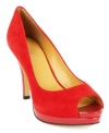 Expand your wardrobe with the perfectly poised and always versatile Danee peep-toe pumps by Nine West.