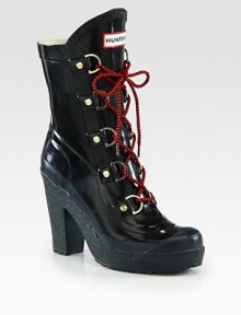 Vibrant laces top this durable rubber boot with a towering heel and platform. Rubber heel, 4½ (115mm)Rubber platform, 1 (25mm)Compares to a 3½ heel (90mm)Shaft, 6½Leg circumference, 12Rubber upperNylon liningRubber trek solePadded insoleImported