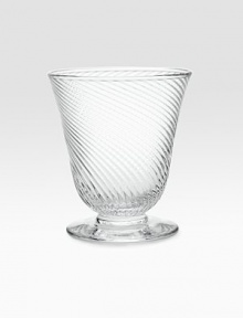 A stemless, mouthblown red wine glass weds modern design with classic style thanks to a gentle, wrap-around texture. From the Twirl CollectionGlass4¼H X 3¾ diam.Dishwasher safeImported A stemless, mouthblown red wine glass weds modern design with classic style thanks to a gentle, wrap-around texture. From the Twirl CollectionGlass4¼H X 3¾ diam.Dishwasher safeImported