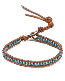 Chan Luu wraps up the boho luxe look with this leather bracelet, accented by a free-spirited mix of semi precious stones and colored crystals.