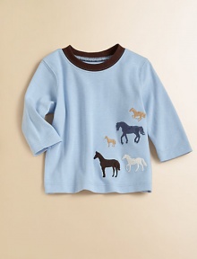 A long-sleeved cotton top is extra cute with contrast crewneck and an embroidered horse pattern.CrewneckLong sleevesPullover styleCottonMachine washImported