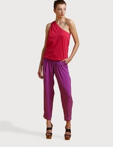 Give 'em the bold shoulder in a reversible style of vibrant silk.Pink side reverses to lime Gathered single shoulder Blouson waist Fully lined About 25, shoulder to hem 95% silk/5% spandex Dry clean Imported Give 'em the bold shoulder in a reversible style of vibrant silk.Pink side reverses to lime Gathered single shoulder Blouson waist Fully lined About 25, shoulder to hem 95% silk/5% spandex Dry clean Imported