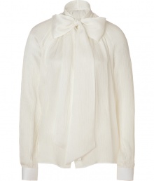 Classic ivory tie-neck silk blouse from Ferragamo -Add elegant refinement to your dress up looks with this lavish blouse - Billowy silhouette with tie-neckline, and draped back detail - Style with a pencil skirt, patterned tights, and a luxe tuxedo-inspired jacket