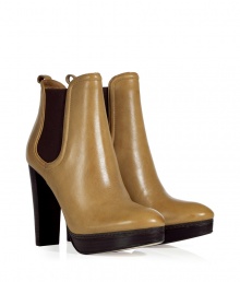 This must-have ankle boot is a versatile new season must-have - Pointed toe, front platform, ankle length, elasticized side panels, chunky high heel, back pull-on tab - Wear with skinny jeans, a mini skirt, or cropped trousers This must-have ankle boot is a versatile new season must-have - Pointed toe, front platform, ankle length, elasticized side panels, chunky high heel, back pull-on tab - Wear with skinny jeans, a mini skirt, or cropped trousers