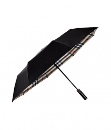 Iconic and essential, Burberry Londons characteristic check umbrella will keep your look in line on even the dreariest of days - Automatic folding feature - Carry with a tailored trench and chic rubber rain boots Iconic and essential, Burberry Londons characteristic check umbrella will keep your look in line on even the dreariest of days - Automatic folding feature - Carry with a tailored trench and chic rubber rain boots