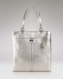 A hardworking wardrobe starts with wear-with-all accessories like this leather tote from Cole Haan. In leather with a spacious silhouette, it's idea for desk or dinner. A hardworking wardrobe starts with wear-with-all accessories like this leather tote from Cole Haan. In leather with a spacious silhouette, it's idea for desk or dinner.