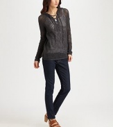 Hooded go-to with dropped shoulders, open stitching and a lace-up v-neck. Lace-up v-neckAttached hoodDropped shouldersRolled hem70% cotton/30% linenDry cleanImportedModel shown is 5'10 (177cm) wearing US size Small.