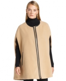 Calvin Klein makes this cape fashion-forward with faux leather trim and a zip front closure.