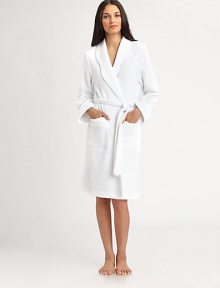 This cozy knit, perfect for after-shower comfort or lounging, feels wonderful against the skin.Patch pockets Waist-cinching self tie About 39½ from shoulder to hem 60% polyester/40% cotton; machine wash Imported This cozy knit, perfect for after-shower comfort or lounging, feels wonderful against the skin.Patch pockets Waist-cinching self tie About 39½ from shoulder to hem 60% polyester/40% cotton; machine wash Imported