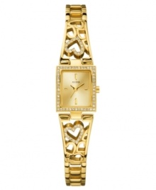 Glistening gold tone melds with Swarovski crystal rhinestone accents in this heartfelt watch from GUESS. Glistening gold tone melds with Swarovski crystal rhinestone accents in this heartfelt watch from GUESS.