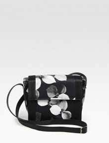 Lush florals highlight butter-smooth calfskin in this petite structured carryall.Shoulder strap, 21½ dropFlap snap closureTwo open pockets under flapOne inside open pocketFully lined9¾W X 7½H X 2½DMade in Italy Lush florals highlight butter-smooth calfskin in this petite structured carryall.Shoulder strap, 21½ dropFlap snap closureTwo open pockets under flapOne inside open pocketFully lined9¾W X 7½H X 2½DMade in Italy