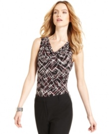 A sweeping neckline and graphic dots make Calvin Klein's petite top a must-have for pairing with tailored suits and office separates alike. A sweeping neckline and graphic dots make Calvin Klein's petite top a must-have for pairing with tailored suits and office separates alike.