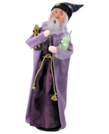 Shocked by the success of his own magic, this mystical wizard stands back to admire its results. Traditional wizarding garb – a star-patterned hat and long cloak – make the Byers' Choice figurine a Halloween favorite. Shocked by the success of his own magic, this mystical wizard stands back to admire its results. Traditional wizarding garb – a star-patterned hat and long cloak – make the Byers' Choice figurine a Halloween favorite.
