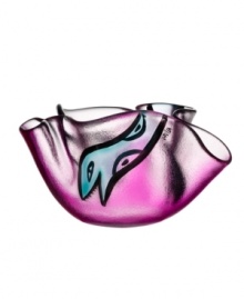 A friendly face slithers in between the folds of magenta-colored glass in this handcrafted Happy Going bowl, a fun surprise for modern interiors. Designed by Ulrica Hydman-Vallien for Kosta Boda.