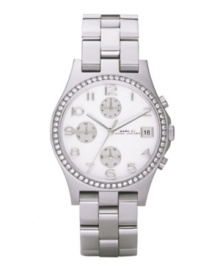Sit pretty and sophisticated with this chic Henry watch by Marc by Marc Jacobs. Stainless steel bracelet and round case. Bezel embellished with crystal accents. White chronograph dial features applied silvertone numerals at markers, date window at three o'clock, three silvertone subdials, three hands and subtle logo. Quartz movement. Water resistant to 30 meters. Two-year limited warranty. Sit pretty and sophisticated with this chic Henry watch by Marc by Marc Jacobs. Stainless steel bracelet and round case. Bezel embellished with crystal accents. White chronograph dial features applied silvertone numerals at markers, date window at three o'clock, three silvertone subdials, three hands and subtle logo. Quartz movement. Water resistant to 30 meters. Two-year limited warranty.