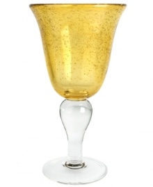 The eye-catching Iris goblet makes a big impact in any setting with a fresh citrine color and tiny bubbles trapped in dishwasher-safe glass. From Artland. The eye-catching Iris goblet makes a big impact in any setting with a fresh citrine color and tiny bubbles trapped in dishwasher-safe glass. From Artland.