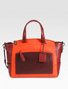Luxurious pebbled leather in a chic, colorblocked design with a soft shape and a versatile, detachable strap.Double top handles, 7 dropDetachable shoulder strap, 15 dropTop zip closureProtective metal feetOne outside zip pocketThree outside open pocketsOne inside zip pocketTwo inside open pocketsCotton lining14½W X 12H X 6½DMade in Italy Luxurious pebbled leather in a chic, colorblocked design with a soft shape and a versatile, detachable strap.Double top handles, 7 dropDetachable shoulder strap, 15 dropTop zip closureProtective metal feetOne outside zip pocketThree outside open pocketsOne inside zip pocketTwo inside open pocketsCotton lining14½W X 12H X 6½DMade in Italy