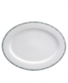 Inspire calm around the table with the effortless grace of Perennial Green serveware and serving dishes from Nikko. Green vines wind across swaths of pale blue on an oval platter and vegetable bowl that are as durable as they are stylish. Inspire calm around the table with the effortless grace of Perennial Green serveware and serving dishes from Nikko. Green vines wind across swaths of pale blue on an oval platter and vegetable bowl that are as durable as they are stylish.
