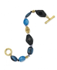 Inspired by the beauty of the French Riviera, this gorgeous bracelet from Lauren by Ralph Lauren showcases colorful glass and resin beads with gold tone textured accents. Setting and toggle clasp crafted in 14k gold-plated mixed metal. Approximate length: 7-3/4 inches.