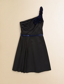 Both dramatic and romantic, this one-shoulder satin style has a ruffled strap that eases into cascading rosettes, and lots of pretty pleating.Angled necklineRuffled shoulder strapContrast rosettes at one sideDiagonally pleated bodiceSatin ribbon at waistSkirt pleats at one sideSide zip closeSmooth backPolyesterMachine washImported Both dramatic and romantic, this one-shoulder satin style has a ruffled strap that eases into cascading rosettes, and lots of pretty pleating.Angled necklineRuffled shoulder strapContrast rosettes at one sideDiagonally pleated bodiceSatin ribbon at waistSkirt pleats at one sideSide zip closeSmooth backPolyesterMachine washImported
