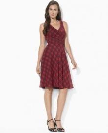 Traditionally rugged tartan looks utterly flirtatious on Lauren Ralph Lauren's lightweight surplice dress, designed with a sleeveless silhouette and soft gathers at the waist. Traditionally rugged tartan looks utterly flirtatious on Lauren Ralph Lauren's lightweight surplice dress, designed with a sleeveless silhouette and soft gathers at the waist.