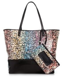 Go big or go home. This ultra-roomy carryall from Nine West is dressed to be seen in sassy cheetah print with shimmery sequin overlay. Easily stows everything you need from work laptop to workout wear, and the adorable matching wristlet keeps cash, cards and ID easily at hand. Go big or go home. This ultra-roomy carryall from Nine West is dressed to be seen in sassy cheetah print with shimmery sequin overlay. Easily stows everything you need from work laptop to workout wear, and the adorable matching wristlet keeps cash, cards and ID easily at hand.