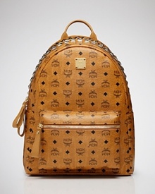 Backpacks are the cool-kid accessory du jour, and MCM's canvas version is a perfect take. Ideal for trips or running errands, this bold bag makes a practical style statement. Backpacks are the cool-kid accessory du jour, and MCM's canvas version is a perfect take. Ideal for trips or running errands, this bold bag makes a practical style statement.