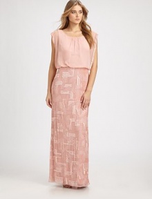 Geometrically patterned sequins adorn the skirt of this blouson chiffon style.Jewel neckline with gathered frontBlouson bodice with sequined edgingAllover sequined skirt with side slitBack keyhole button closureConcealed side zipFully linedAbout 45 from natural waistPolyesterDry cleanImportedModel shown is 5'10 (177cm) wearing US size 4. 