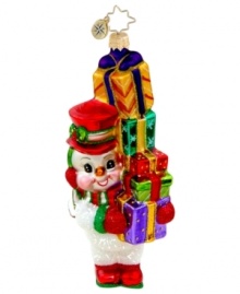 Bring your holiday to new heights with this fine chap from Christopher Radko. Dazzling color and glitter adorn a snowman and stacked gifts with over-the-top splendor.