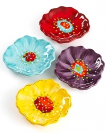 Blossoming in the brightest hues, the hand-painted Chloe floral plates by Laurie Gates serve dessert and snacks or simply accent the table with oodles of cheer. Blossoming in the brightest hues, the hand-painted Chloe floral plates by Laurie Gates serve dessert and snacks or simply accent the table with oodles of cheer.
