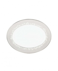 This large bone china platter will hold attention with a delicate floral design with textured white beads and elegant platinum trim. From Lenox's dinnerware and dishes collection. Qualifies for Rebate