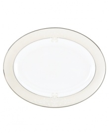Refine your formal table with classic cream and white Lenox dinnerware. Dishes, including this Opal Innocence Scroll bone china oval platter, are trimmed in platinum and accented with a raised dot and scroll pattern, bringing contemporary grace to special occasions. A pearlized finish adds subtle shimmer. Qualifies for Rebate Refine your formal table with classic cream and white Lenox dinnerware. Dishes, including this Opal Innocence Scroll bone china oval platter, are trimmed in platinum and accented with a raised dot and scroll pattern, bringing contemporary grace to special occasions. A pearlized finish adds subtle shimmer. Qualifies for Rebate