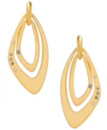 Geometrical gold. Kenneth Cole New York's gold tone orbital drop earrings are made of mixed metal and feature pave crystal accents with gold tone detailing at the post. Approximate drop: 1-3/4 inches. Geometrical gold. Kenneth Cole New York's gold tone orbital drop earrings are made of mixed metal and feature pave crystal accents with gold tone detailing at the post. Approximate drop: 1-3/4 inches.
