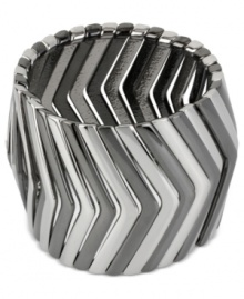 Kenneth Cole New York sets the tone-twice over-in this stretch bracelet. It's crafted from silver- and hematite-tone mixed metal, forming a pattern that's sure to please. Approximate length: 7-1/2 inches.