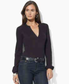 Sleek stretch jersey forms the foundation of a chic split-neck top from Lauren by Ralph Lauren. Sleek stretch jersey forms the foundation of a chic split-neck top from Lauren by Ralph Lauren.