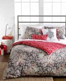 A perfect fusion of floral and paisley lends a look of whimsical beauty to the bedroom in this Sunset and Vines Capri duvet cover set. A neutral white and taupe palette interspersed with pops of vivid color elevates the look. Reverses to a paisley print in bright magenta.