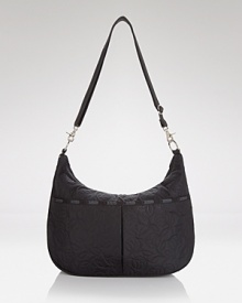 LeSportsac encapsulates effortless accessorizing. This simply styled nylon baby bag works the brand's signature aesthetic with multiple pockets, an interior changing pad, and perfectly proportioned shape. LeSportsac encapsulates effortless accessorizing. This simply styled nylon baby bag works the brand's signature aesthetic with multiple pockets, an interior changing pad, and perfectly proportioned shape.