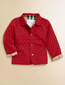 A layer of quilted warmth, comfort and style, that's ultra versatile, ultra easy.Shirt collarLong sleeves with turn-back check cuffsFull snap frontPatch pocketsPolyesterMachine washImported Please note: Number of snaps may vary depending on size ordered. A layer of quilted warmth, comfort and style, that's ultra versatile, ultra easy.Shirt collarLong sleeves with turn-back check cuffsFull snap frontPatch pocketsPolyesterMachine washImported Please note: Number of snaps may vary depending on size ordered.
