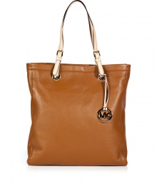 Sophisticated with simple, clean lines, MICHAEL Michael Kors textured leather tote is an elegant and versatile choice - Natural flat double top handles with buckle detail at base, metal logo on front, logo charm attached to handle, inside zippered back wall pocket, front wall slot pocket, cinch strap, strap with clip attached for keys - The perfect choice for work, school or running errands Sophisticated with simple, clean lines, MICHAEL Michael Kors textured leather tote is an elegant and versatile choice - Natural flat double top handles with buckle detail at base, metal logo on front, logo charm attached to handle, inside zippered back wall pocket, front wall slot pocket, cinch strap, strap with clip attached for keys - The perfect choice for work, school or running errands