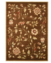 An intricate display of cascading florals creates this purely elegant Lyndhurst area rug from Safavieh. Crafted in Turkey of soft polypropylene, this rug radiates timeless allure with the added convenience of easy-care construction. (Clearance)