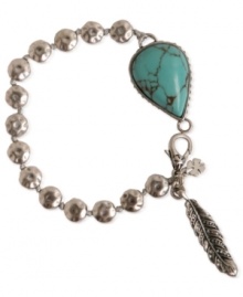 Feeling plucky? This link bracelet from Lucky Brand is crafted from silver-tone mixed metal, and features semi-precious turquoise and glass accents for a casual fashion statement. Item comes packaged in a signature Lucky Brand Box. Approximate length: 7 inches.