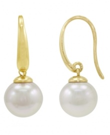 From Spain comes Majorica's interpretation of a fashion classic: pearl earrings. Set in 18k gold over sterling silver, round white organic man-made pearls stun (10 mm). Approximate drop: 1-1/4 inches.