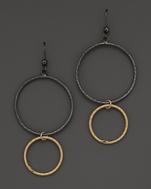 Striking, elegant hoops of black and yellow gold. By Lana.