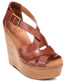Crisscrossing straps add intrigue to Lucky Brand's Suzume platform wedge sandals. Crisscrossing straps add intrigue to Lucky Brand's Suzume platform wedge sandals.