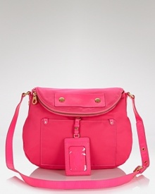 MARC BY MARC JACOBS perfects playful, preppy style with this nylon crossbody bag. MARC BY MARC JACOBS perfects playful, preppy style with this nylon crossbody bag.