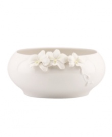 Sculpted orchids pop with a tinge of yellow against this glossy white Flora bowl A quiet beauty in graceful Lenox porcelain. Qualifies for Rebate