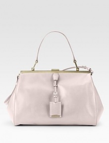 A stunning leather satchel in a luscious shade, features a distinct metal frame with logo tag and leather strap to convert it to a shoulder bag.Top handle, 6 drop Shoulder strap, 9½ drop Clasp closure Protective leather feet One inside zip pocket One credit card slot Nylon lining 12½W X 8½H X 5D Made in Italy