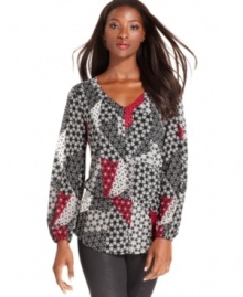 A mixed patchwork print with a touch of red lends this Style&co. top a striking look.